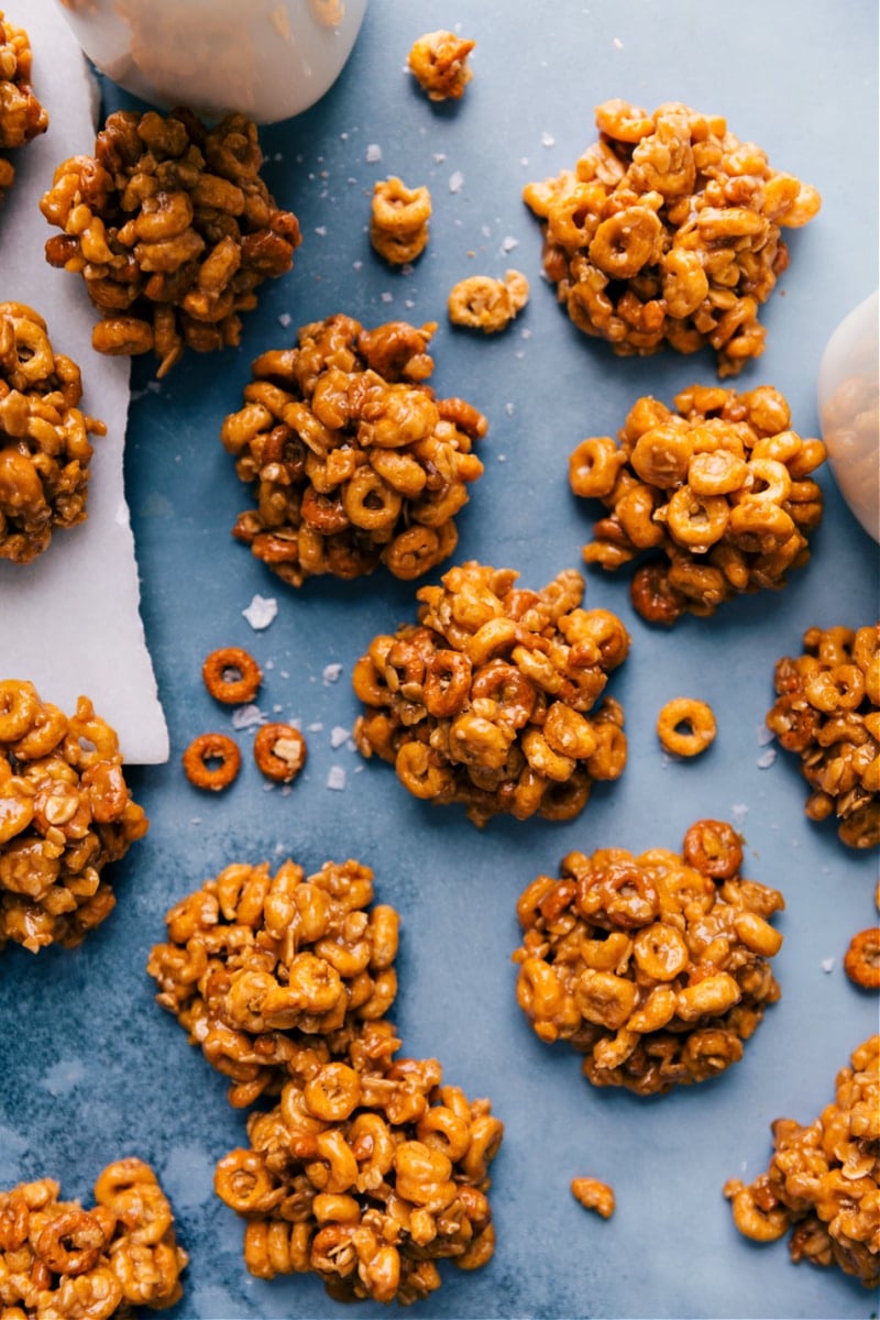Peanut Butter Cereal Bites spread out on a board.