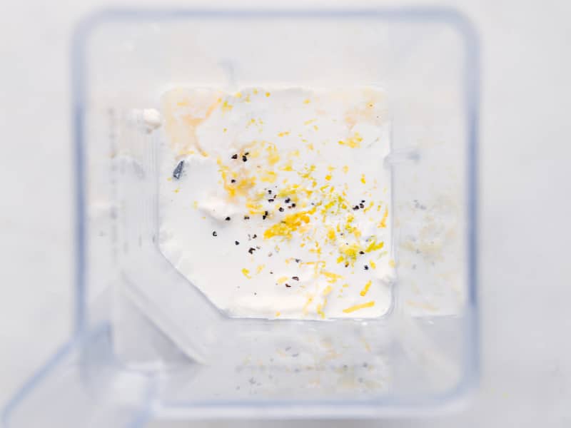 Overhead image of all the ingredients for this dressing being added to a blender