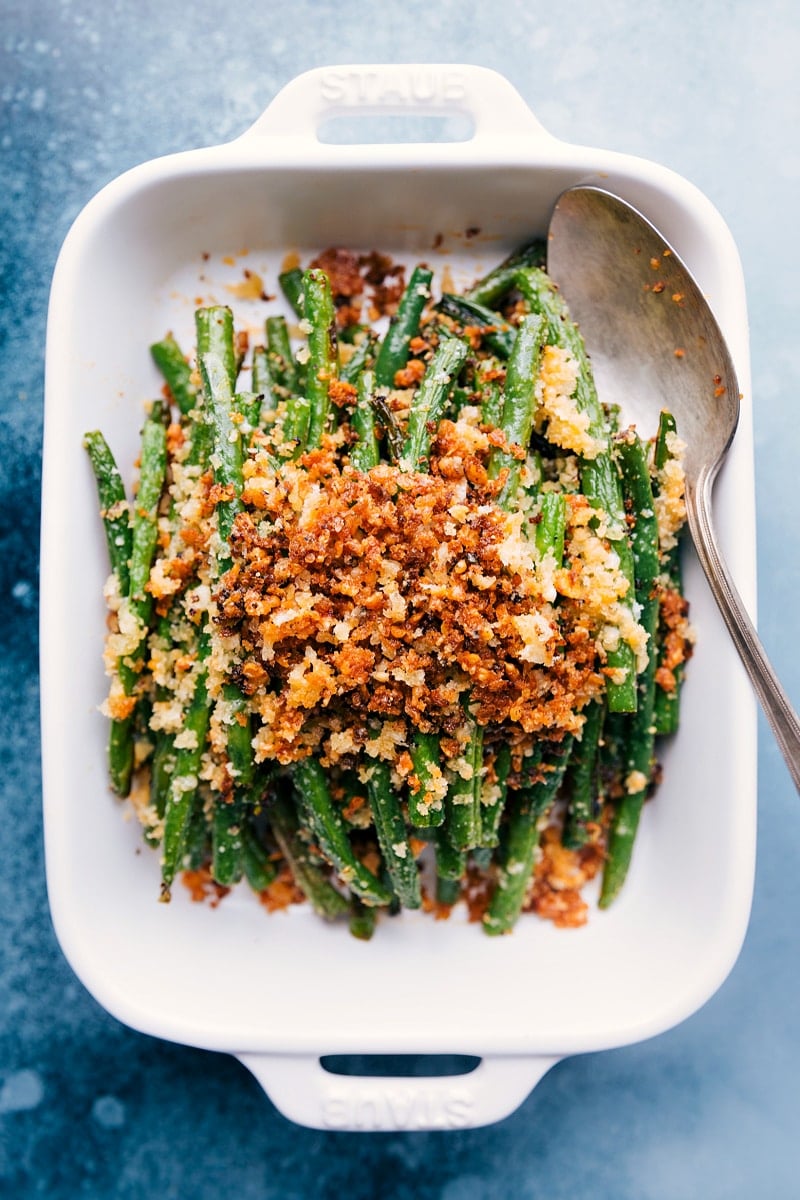 Close-up view of Roasted Green Beans with crumb topping