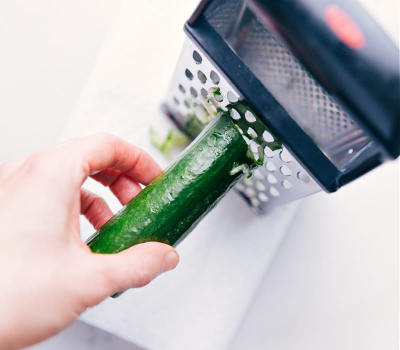 Process shots-- images of the cucumber being shredded