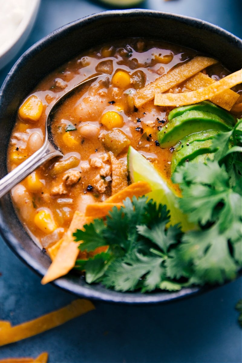 A bowl of White Turkey Chili with toppings