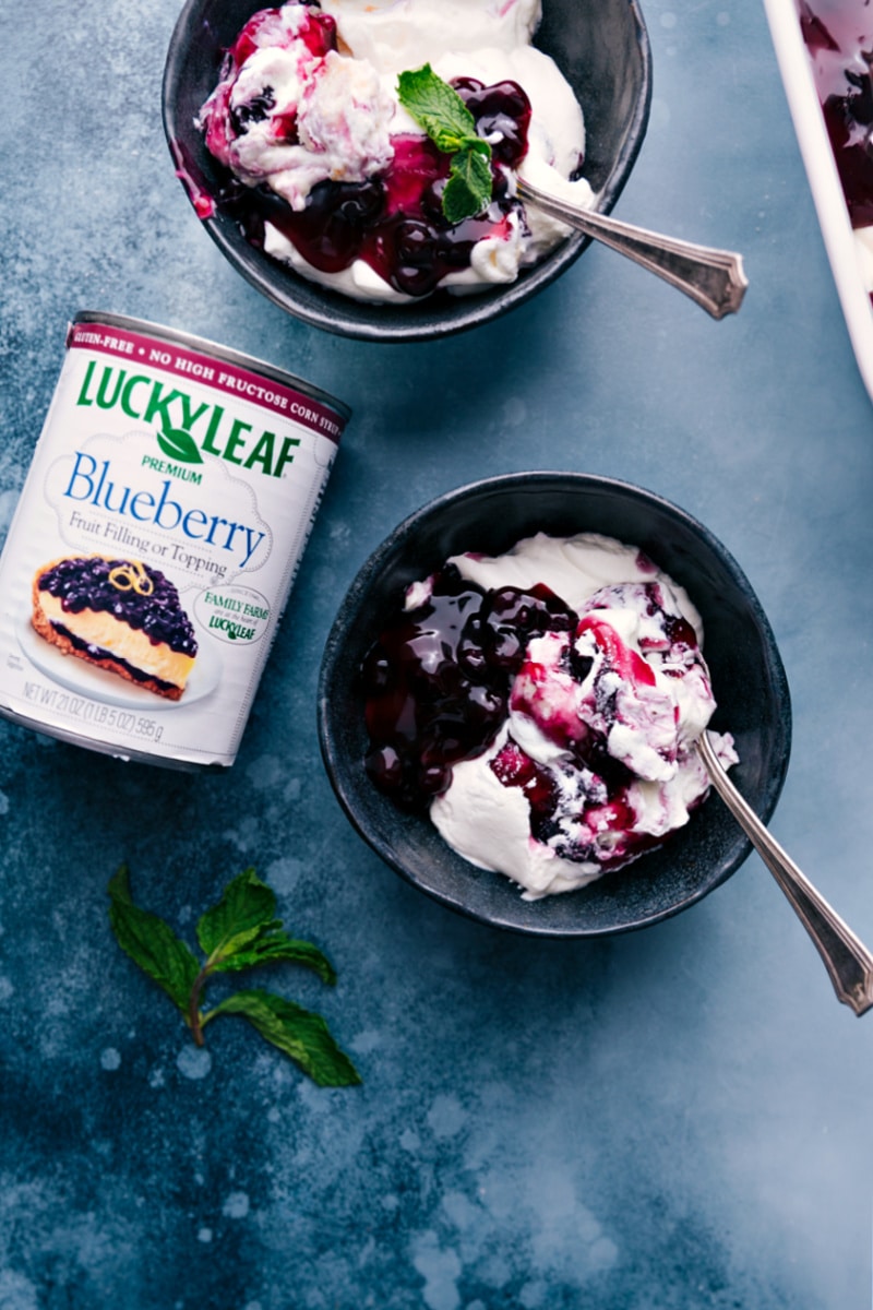 Overhead image of Blueberries and Cream Cake Trifle served in bowls.