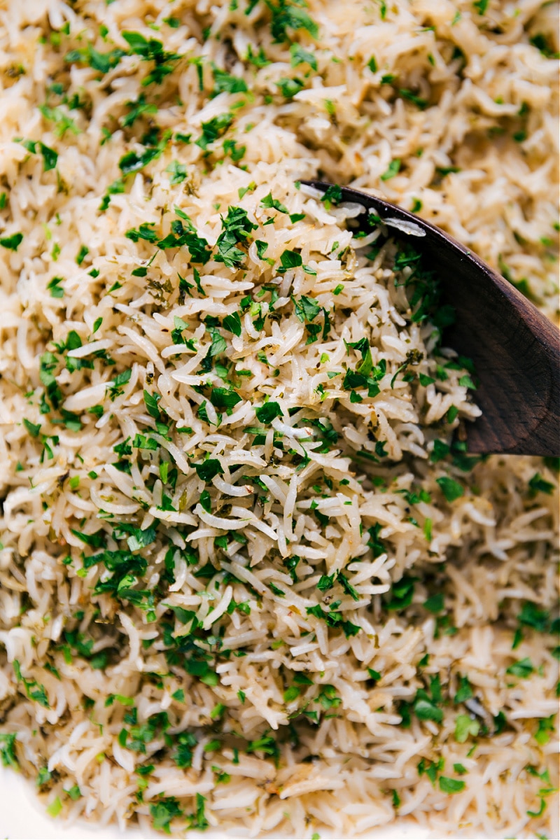 Herb Rice with a scoop being taken out