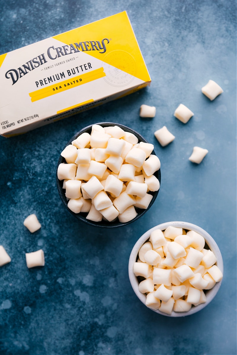 Bowls of Butter Mints with a container of butter nearby