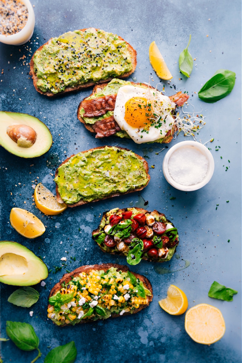 Overhead image of the different avocado toast variations