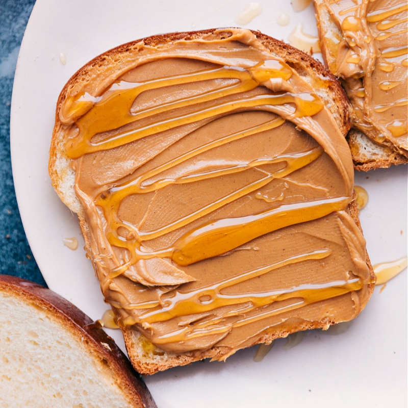 White Bread s;oce with peanut butter and honey on top