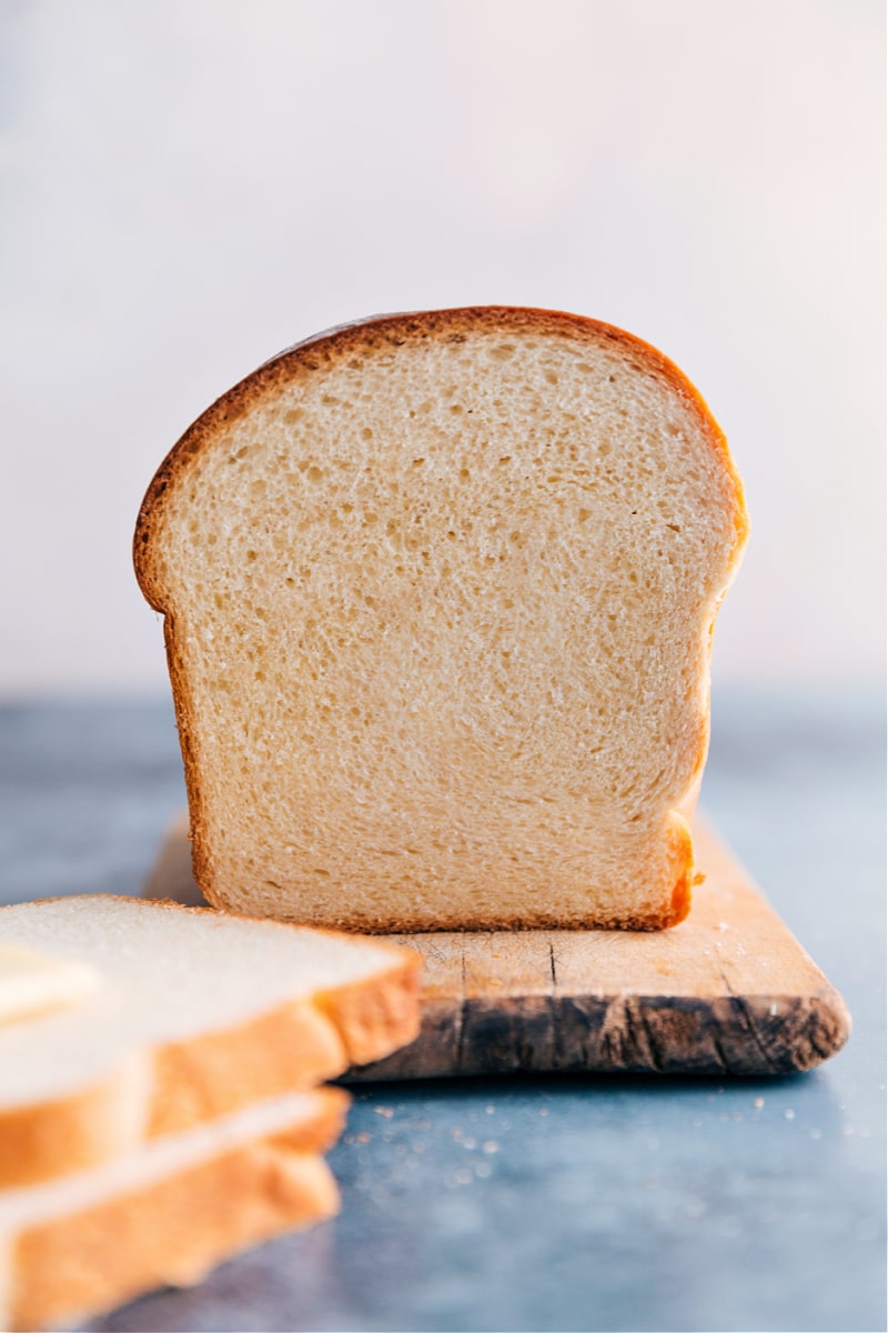 a slice of White Bread cut open to show the inside