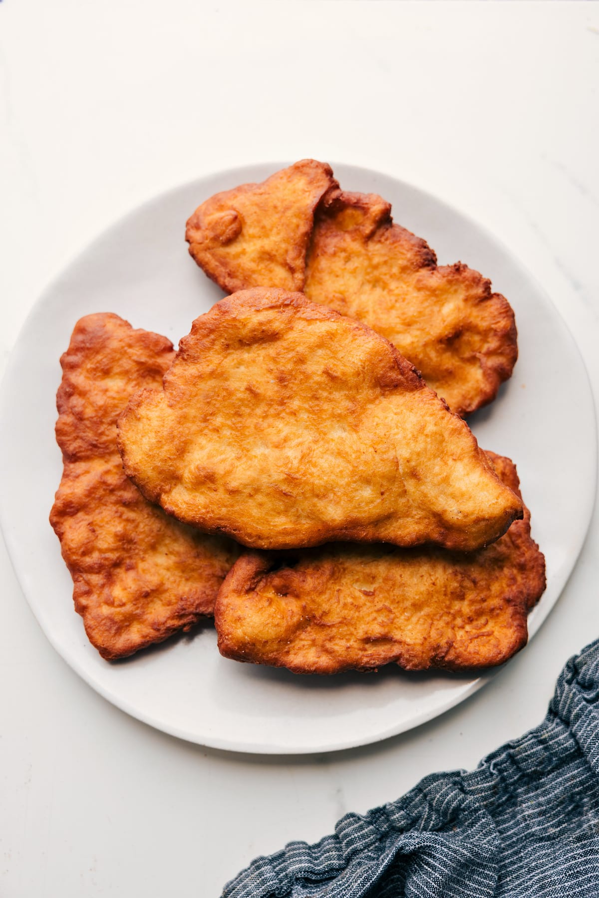 Freshly Fried Fry Bread Fresh and flavorful fry bread recipe served on a plate.