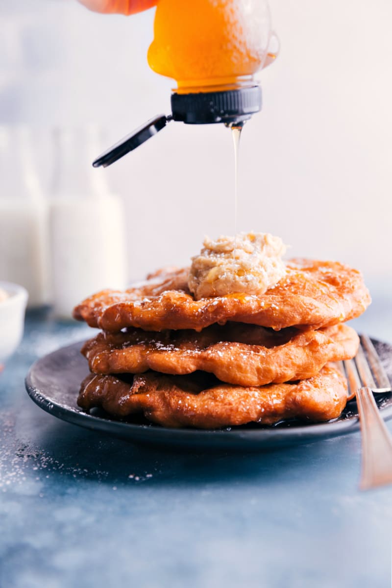 Image of honey being drizzled on the Utah Scones