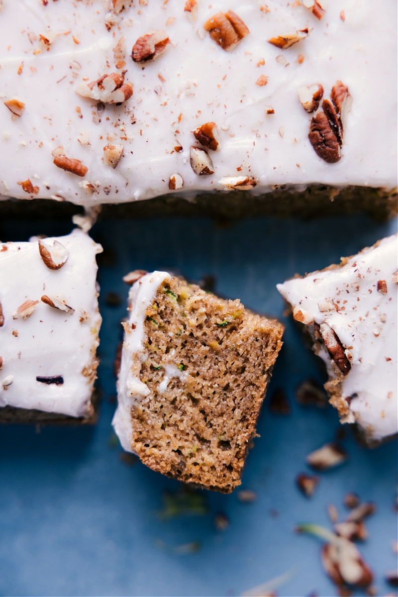 Image of the Zucchini Cake and piece on its side showing the inside
