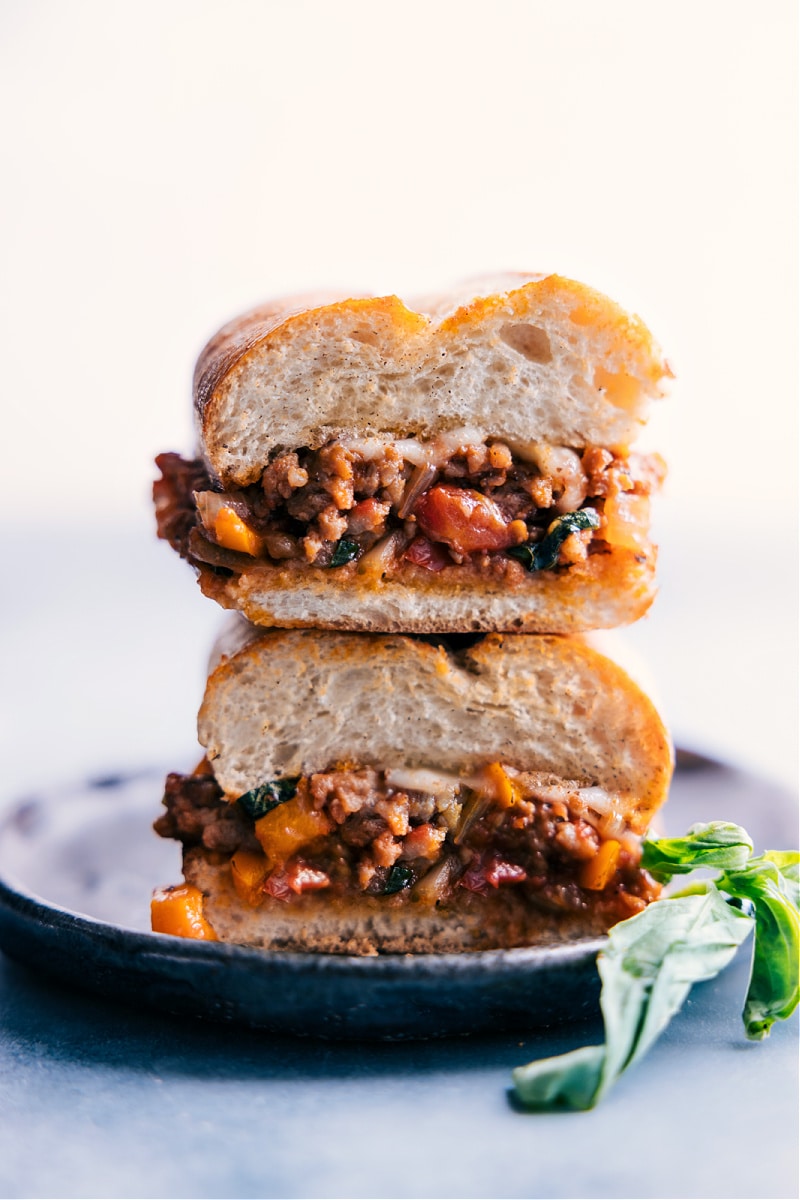 Image of the Italian Hoagies on a plate stacked on top of each other