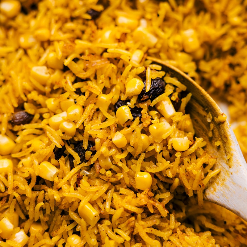 Up close image of a scoop of Yellow Rice