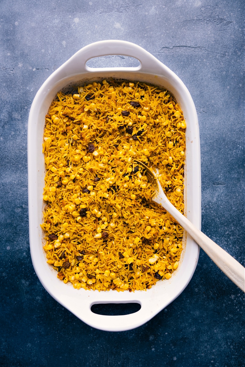 Overhead image of the yellow rice in the casserole dish