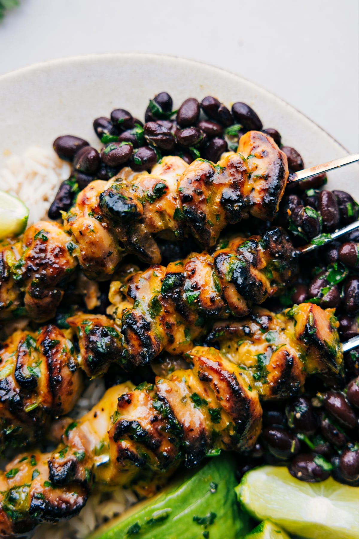 The meat drizzled in the extra sauce ready to be enjoyed.