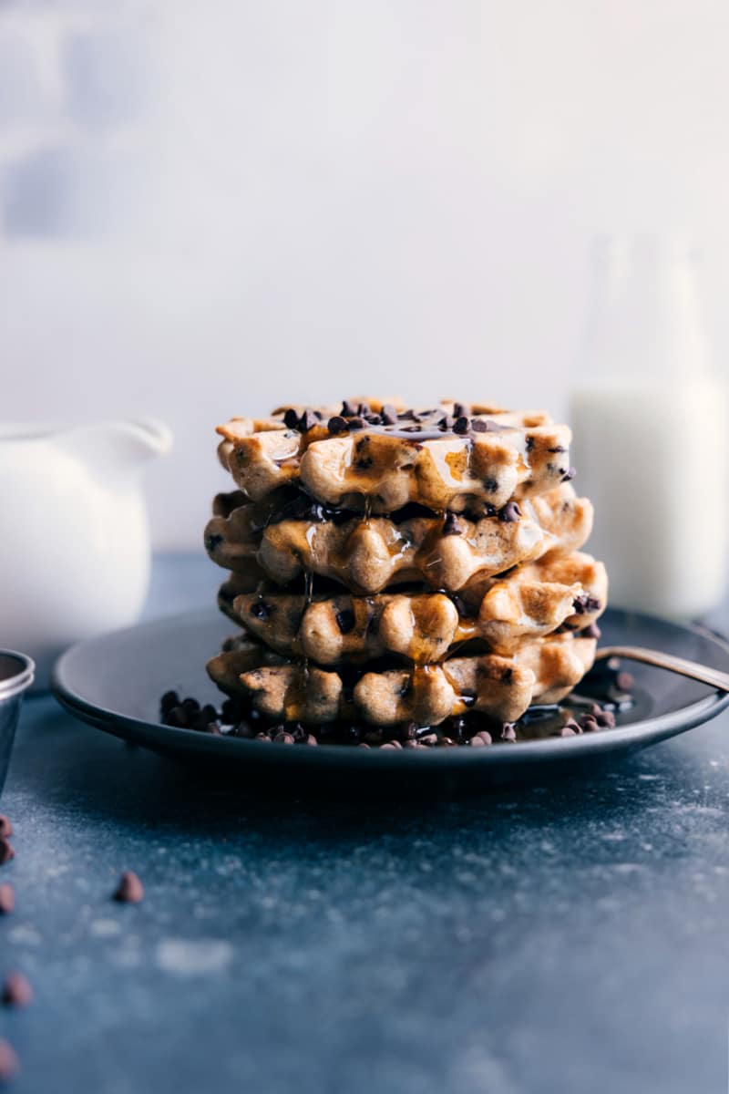A stack of Chocolate Chip Waffles on a plate