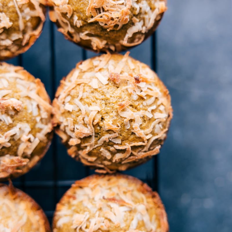 Up-close overhead image of the Pistachio Muffins on a cooling rack