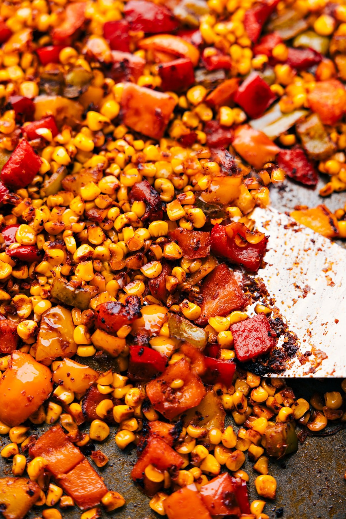 The roasted corn on a sheet pan fresh out of the oven.