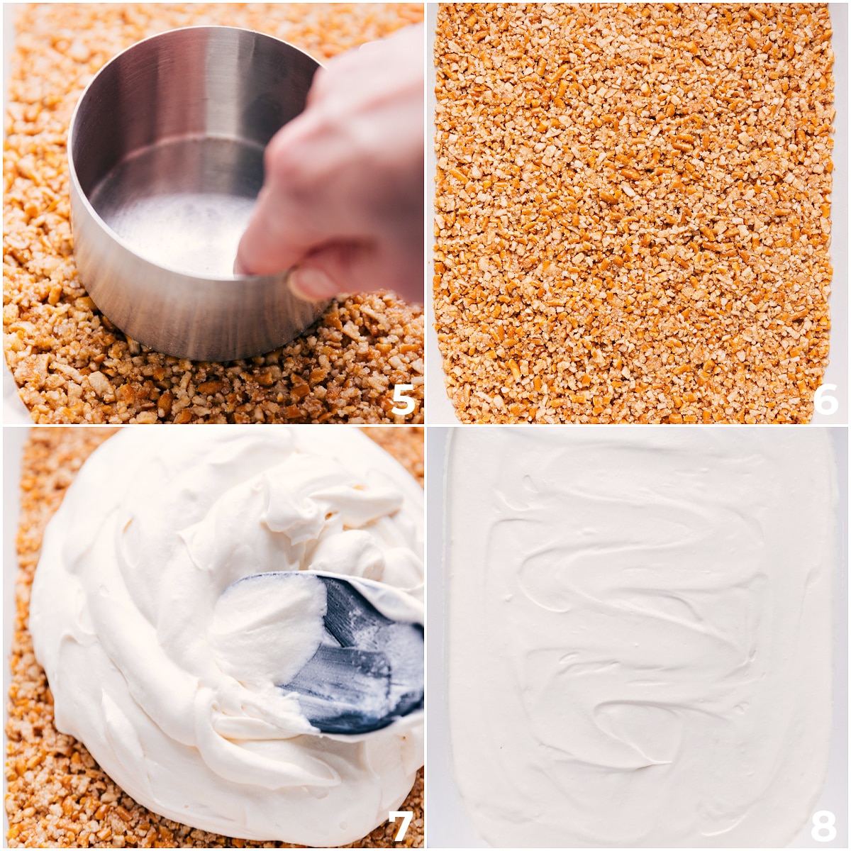 The whipped cream layer being added on top of the crust.