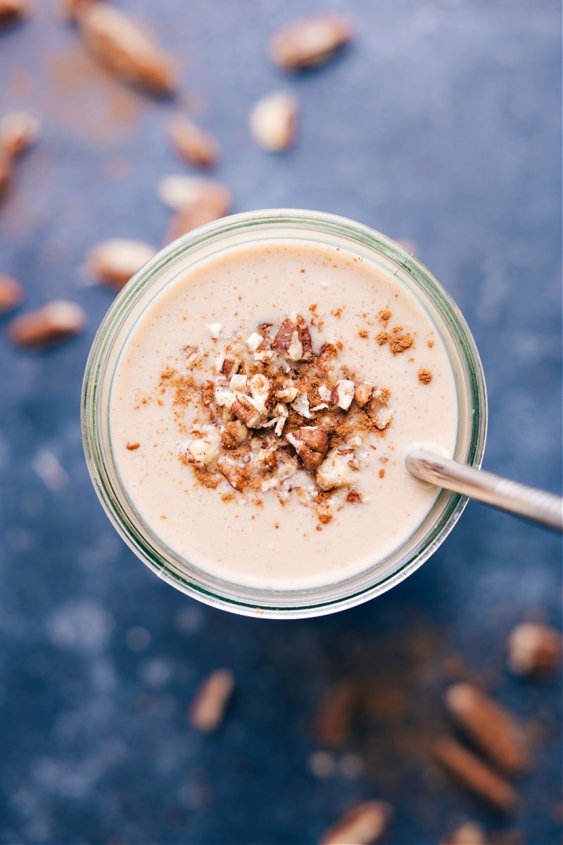 View of the Butter Pecan Smoothie with a straw in it.