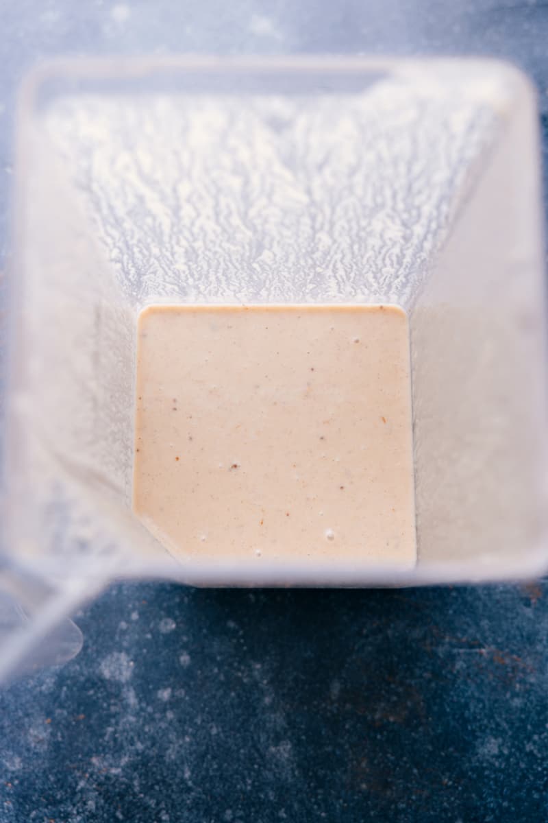 Overhead view of the Butter Pecan Smoothie in the blender, processed until smooth.