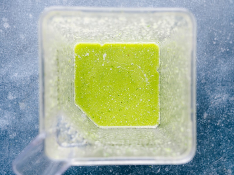 Overhead view of the Cilantro Lime Dressing in the blender after processing
