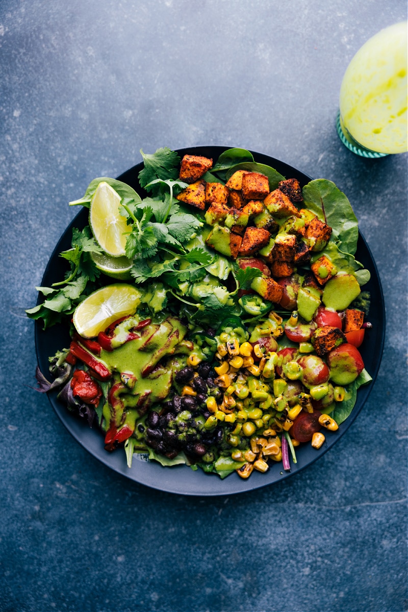 Overhead view of a salad with Cilantro Lime Dressing added