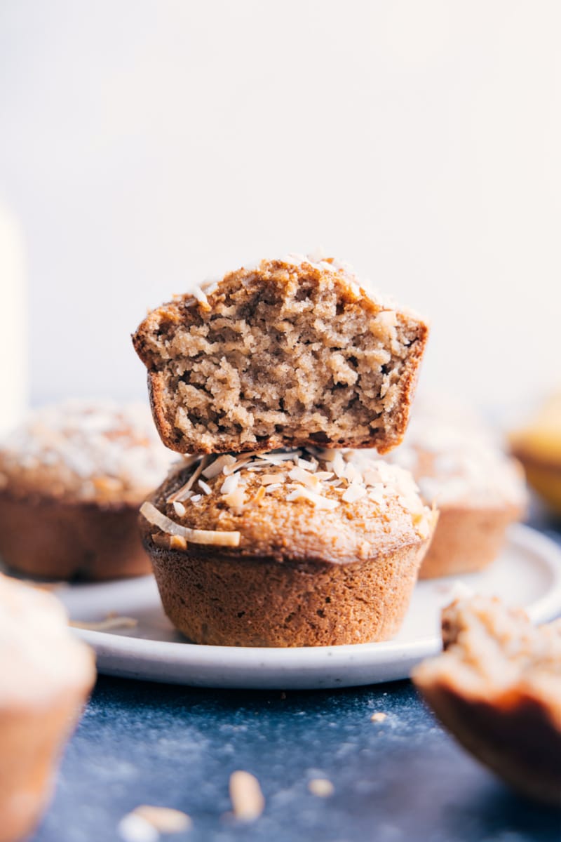 Image of the healthy banana muffins stacked on top of eachother