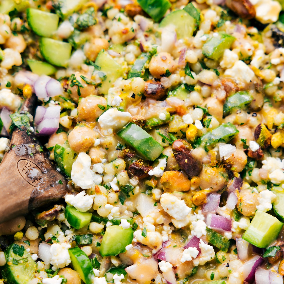 The dressed Jennifer Aniston Salad recipe tossed together and ready to be served at your next get together!