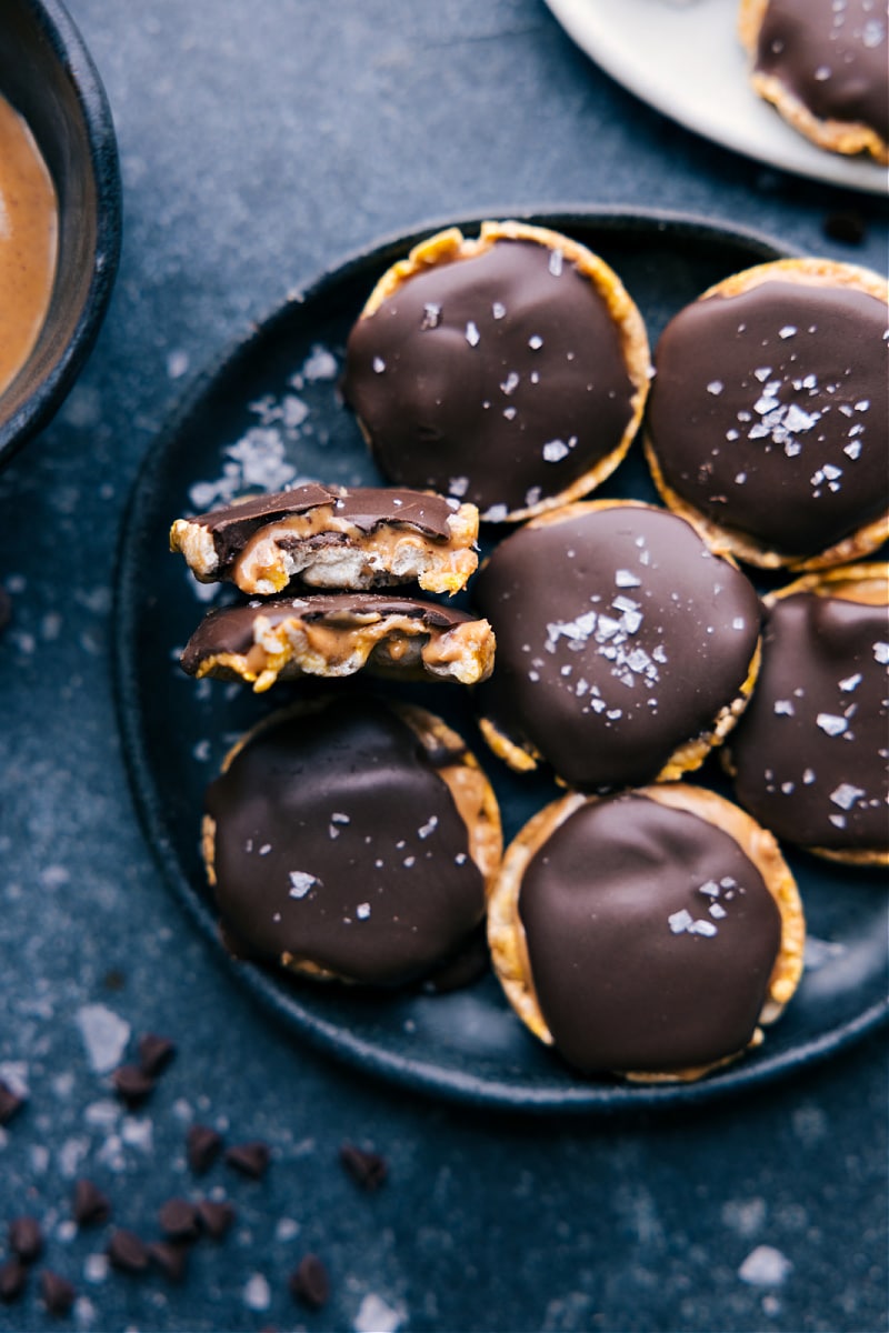 Overhead image of Rice Cakes With Peanut Butter on a plate with a bite out of two of them