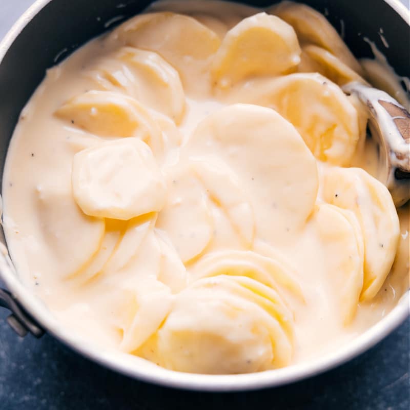 Closeup view of Au Gratin Potatoes in a creamy sauce