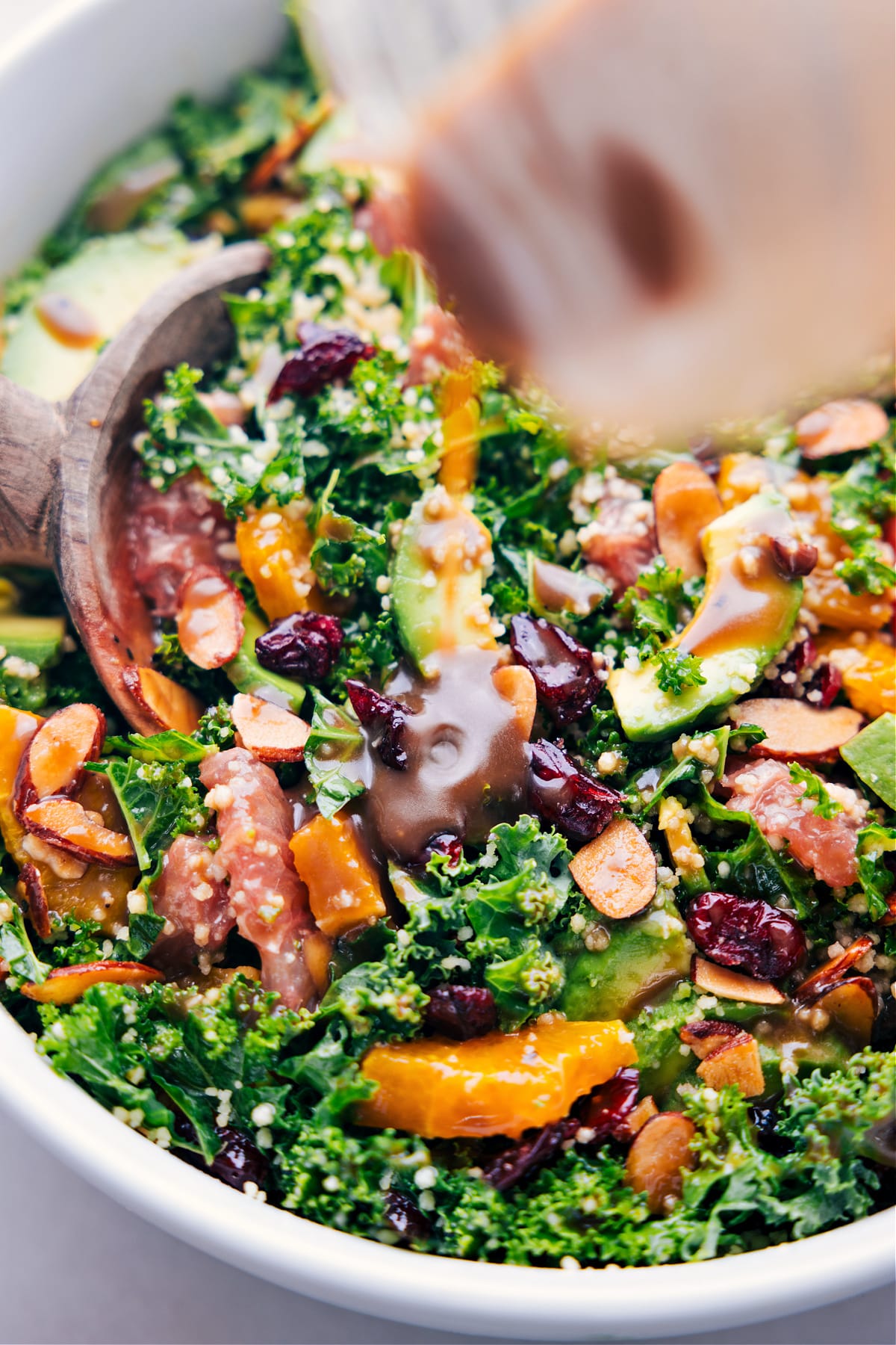 Dressing being poured over the easy grapefruit salad.