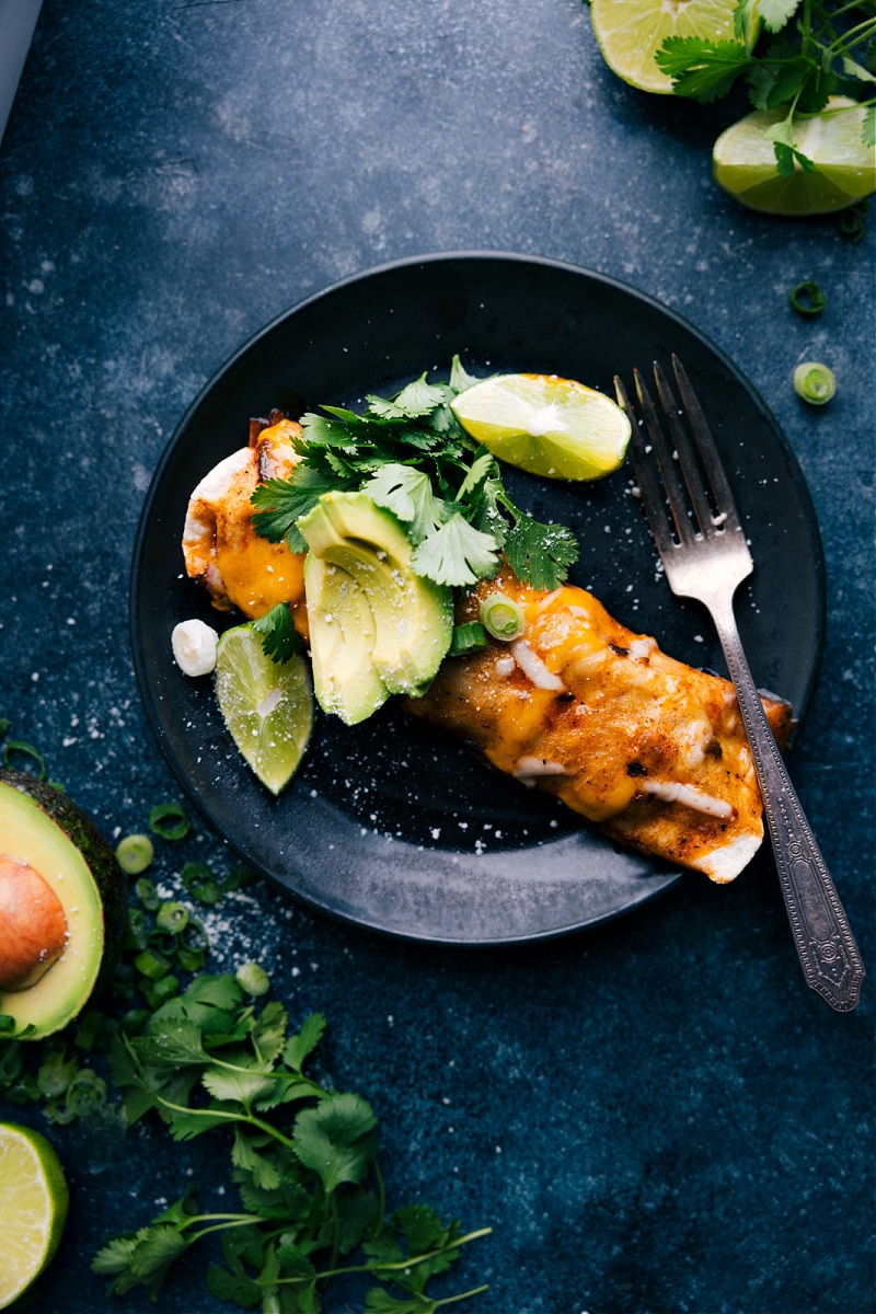 Overhead view of Shredded Beef Enchiladas on a plate.