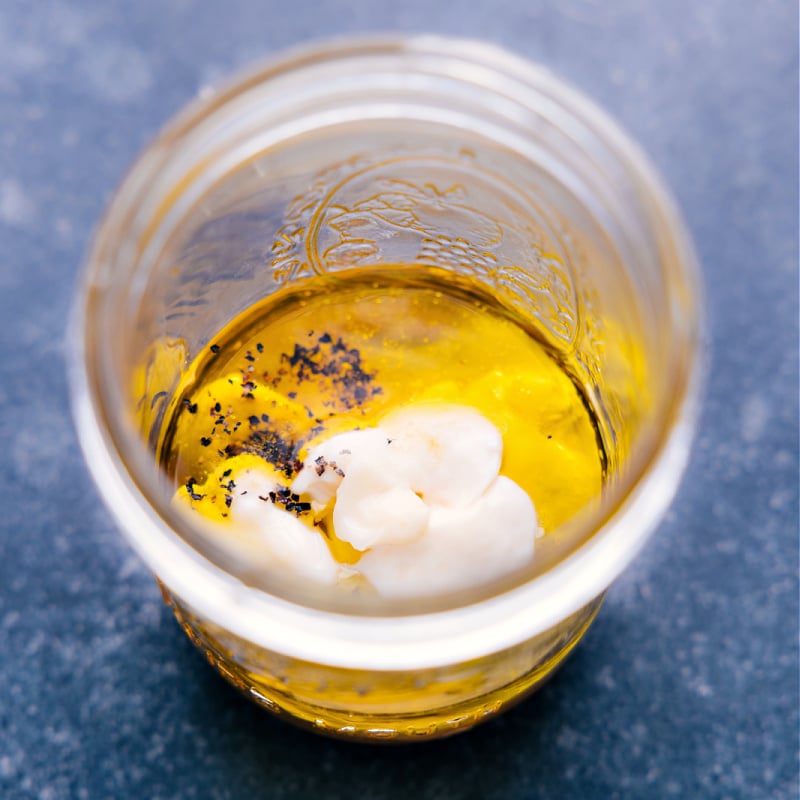 Overhead view of the dressing ingredients, ready to be mixed together