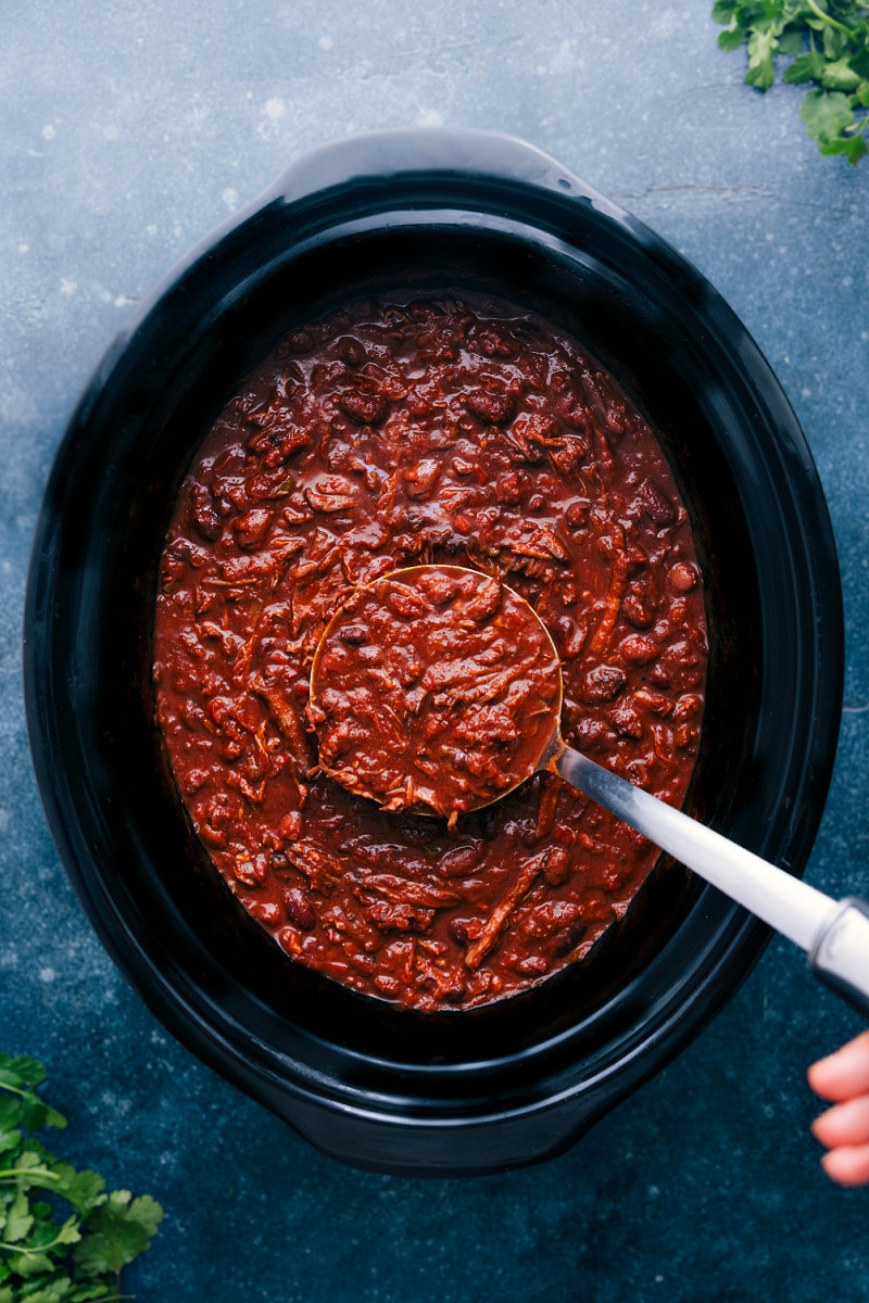 Overhead image of the dish freshly done cooking in the crockpot