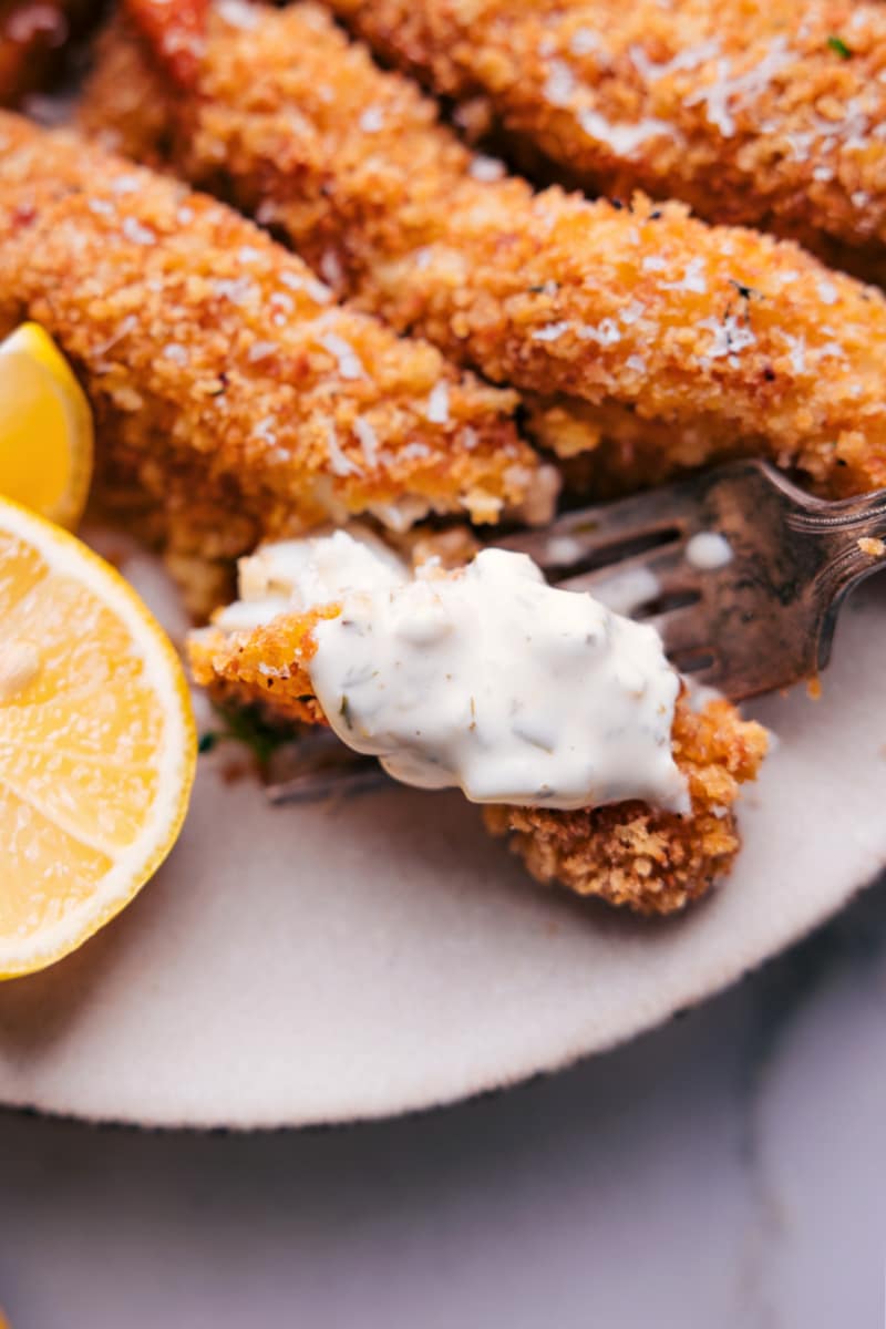 Overhead image of the homemade fish sticks with sauce on top