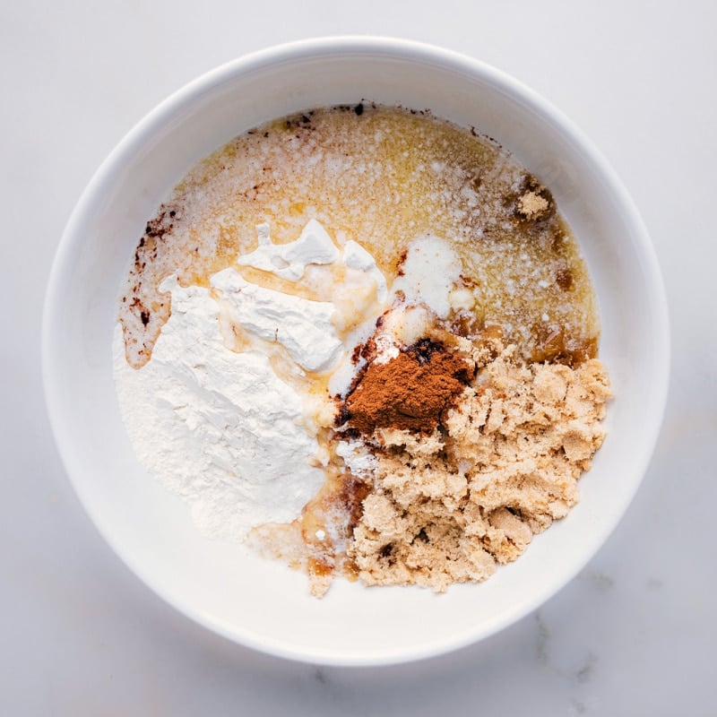 Process shots of how to make streusel-- images off the melted butter being added