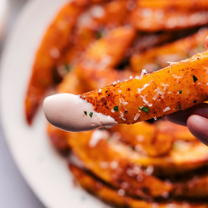 Image of a Potato Wedge dipped in sauce