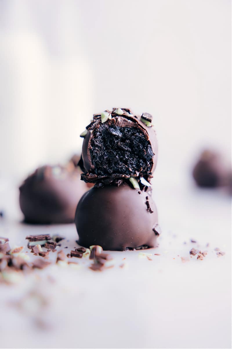 Image of the mint oreo truffles stacked on top of each other