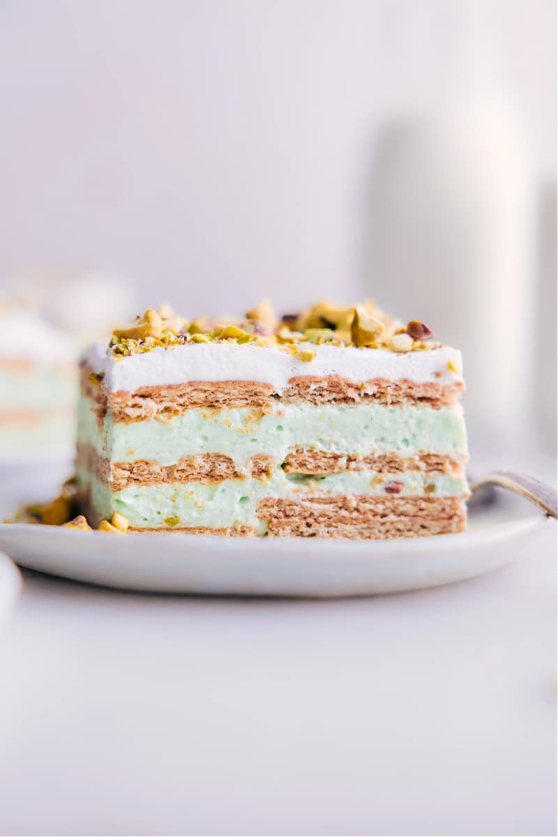 Image of a slice of Pistachio Icebox Cake, ready to be enjoyed