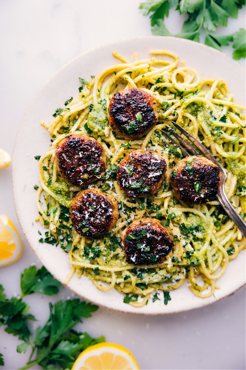 Overhead image of Chicken Meatballs on a bed of pasta ready to be enjoyed