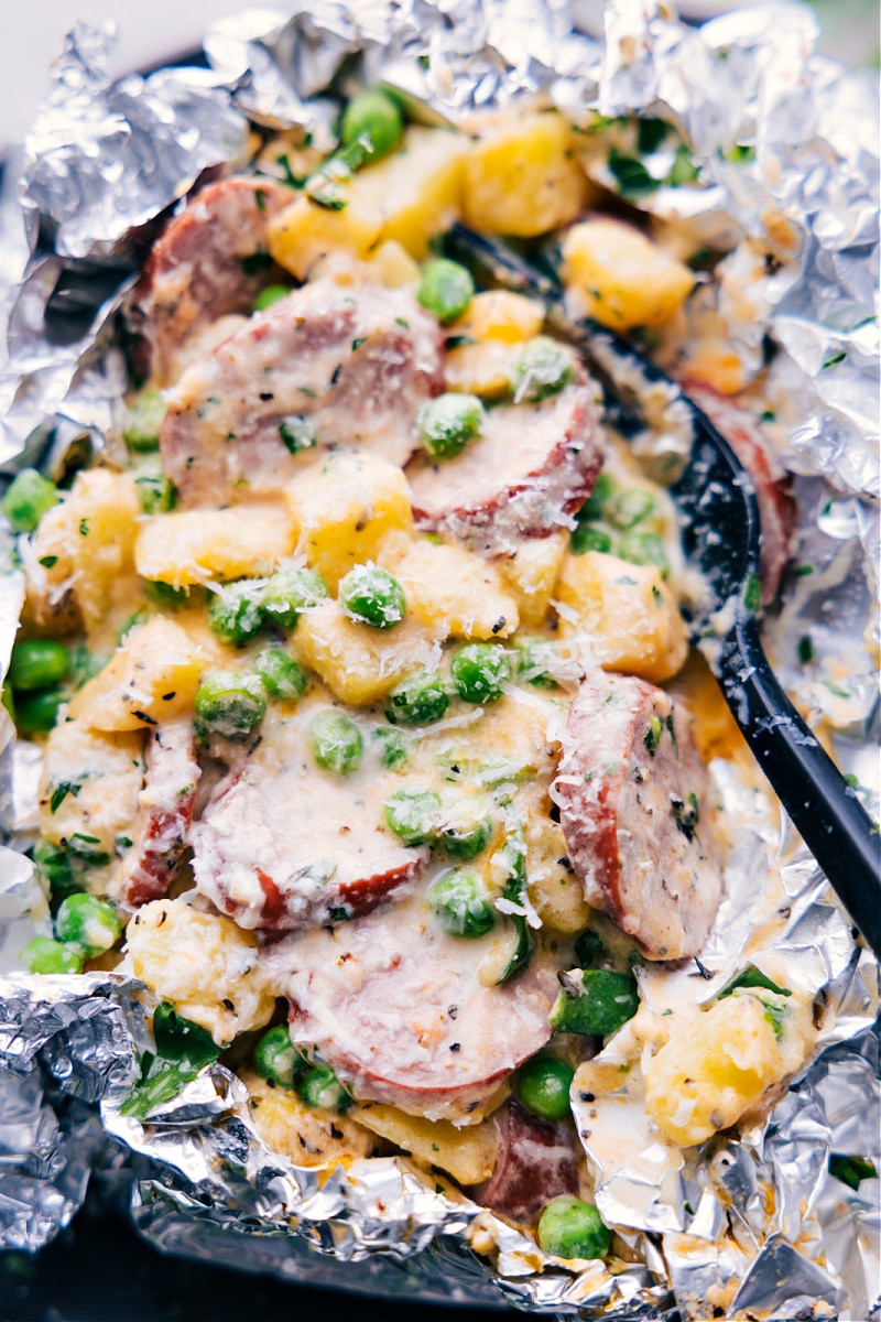 Up close overhead image of the Creamy Sausage and Potato Foil Packs ready to be enjoyed