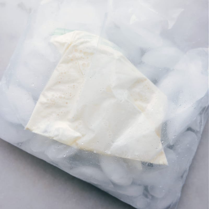 Overhead image of the ice cream in a bag being frozen with the ice