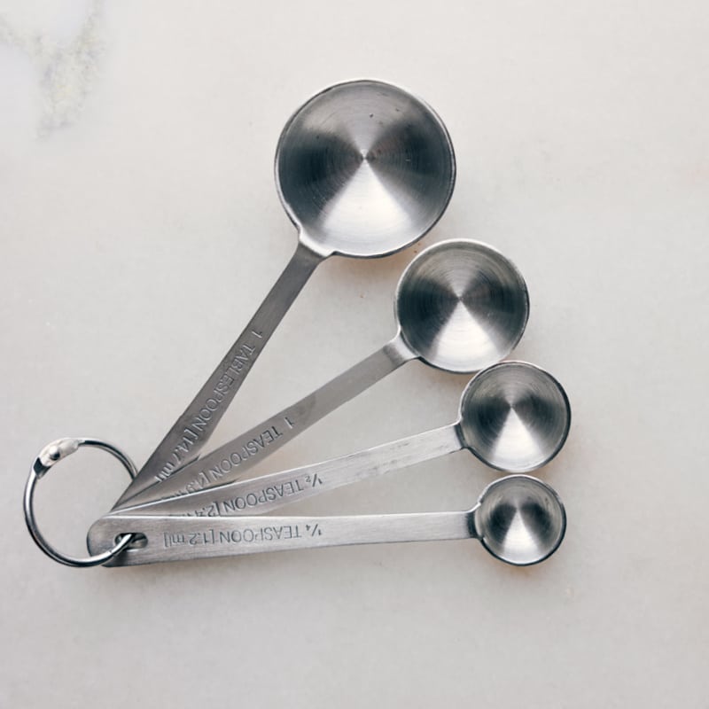 Image of measuring spoons for this kitchen conversion chart