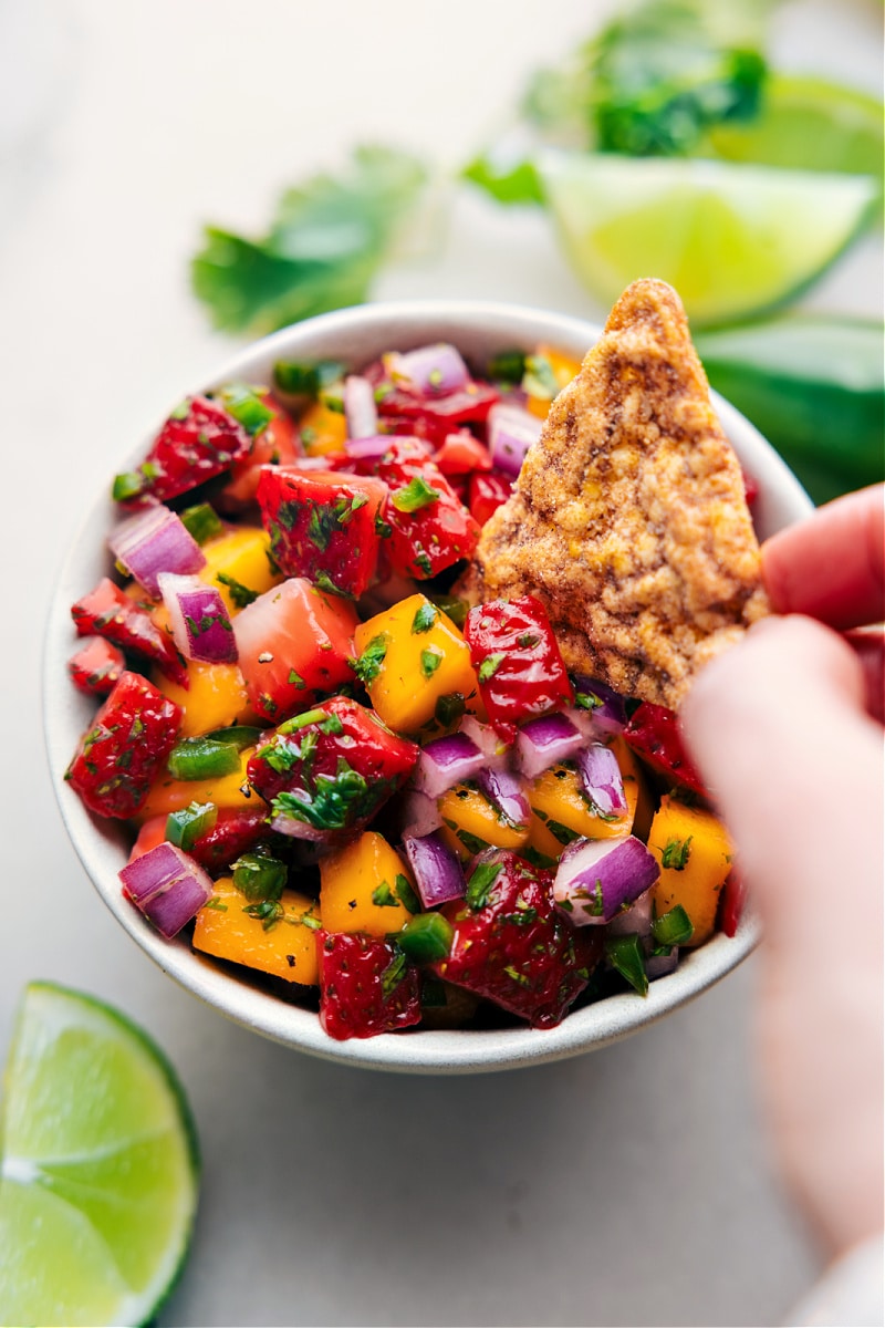 Up close image of the snack with a chip taking a scoop out of it