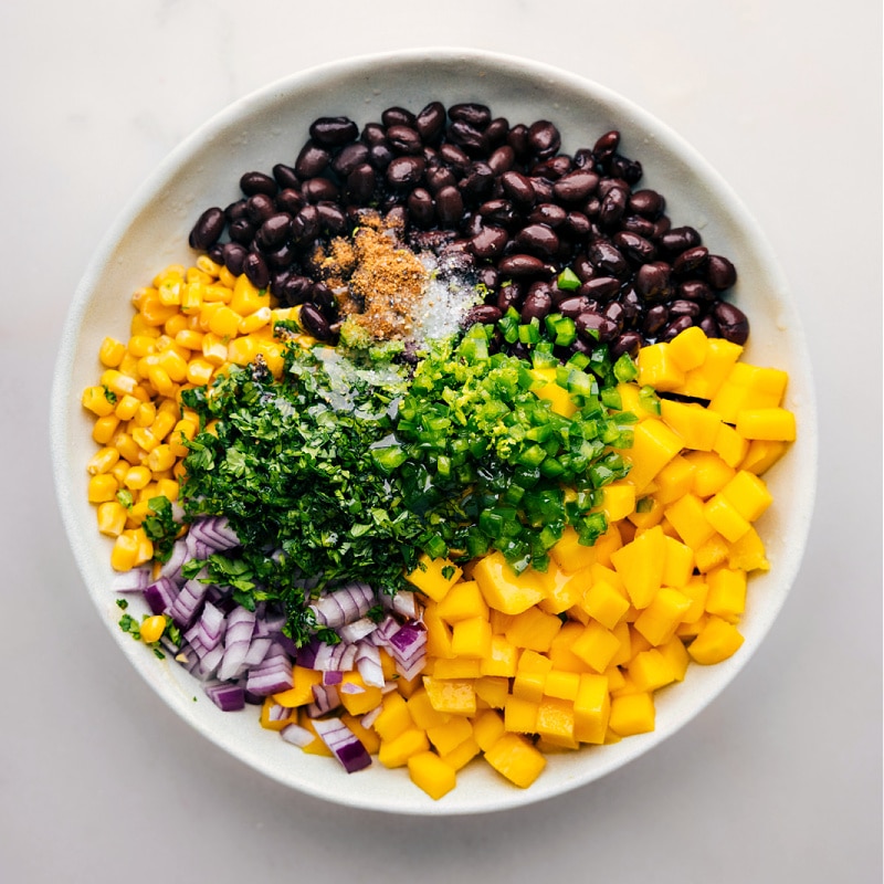 Process shots of Mango Black Bean Salsa-- image of all the ingredients in a bowl