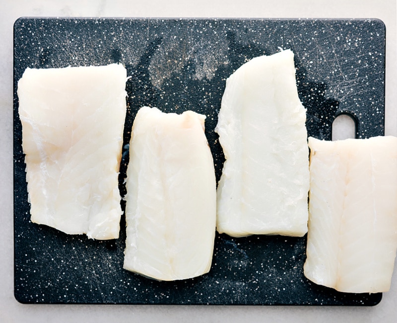 Process shots of Best Baked Cod-- image of the fresh cod cut and ready to go