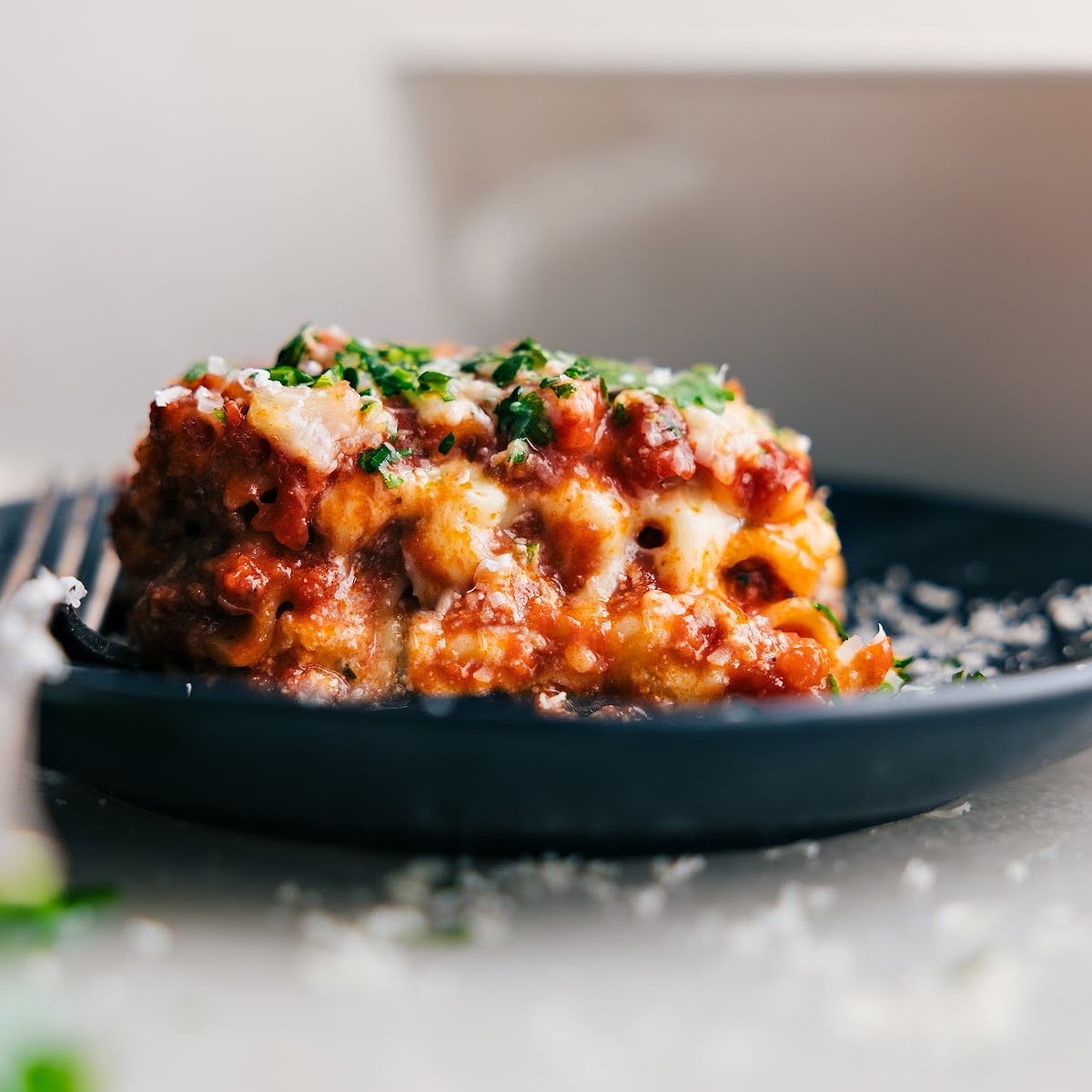 Shot of a piece of lasagna from Chelsea's Messy Apron's food website.