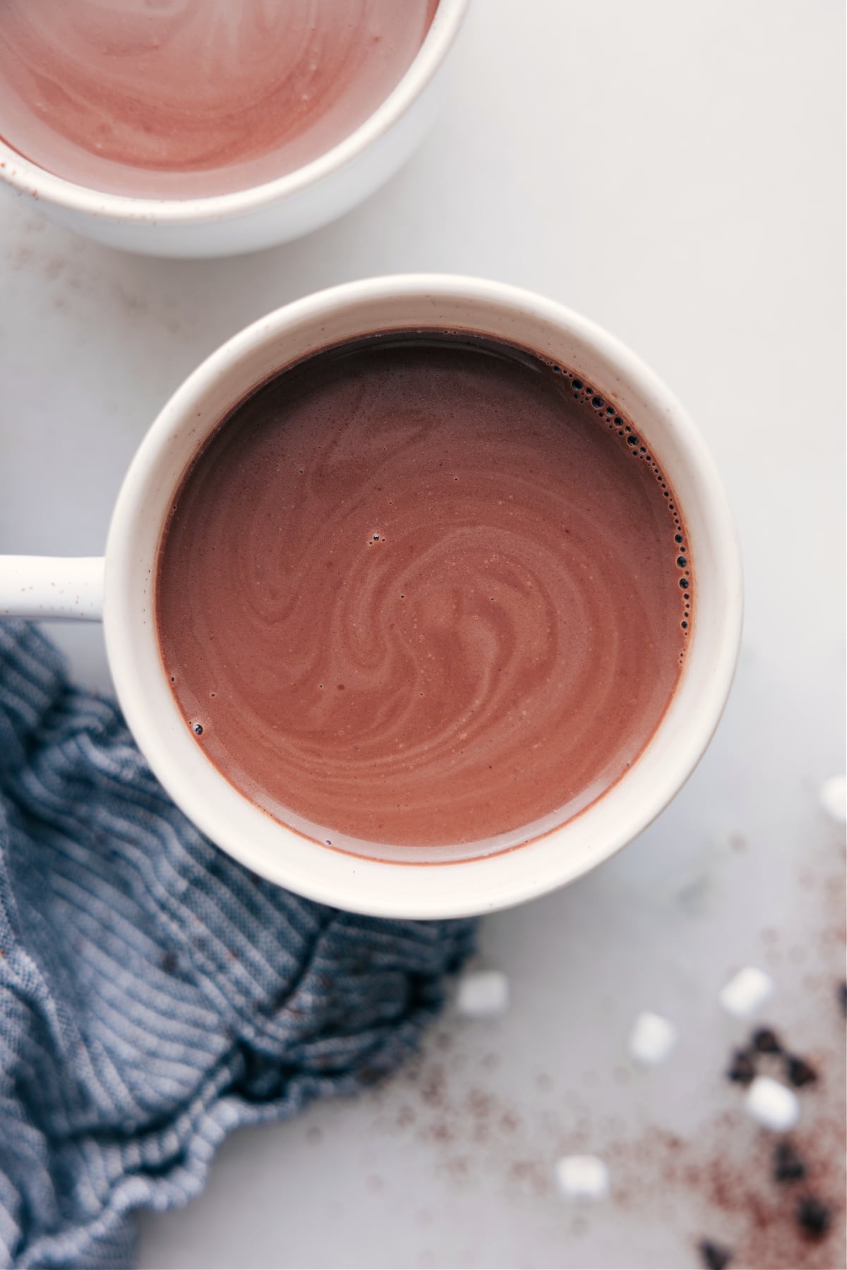 A cup of steaming, swirling hot chocolate, perfectly prepared and ready for enjoyment.