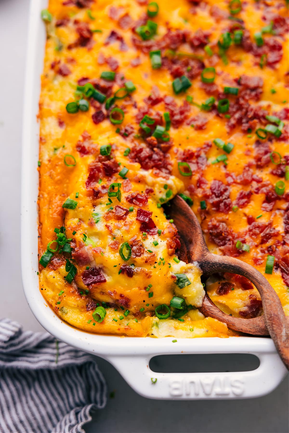 Mouthwatering Twice-Baked Potato Casserole in a casserole dish, ready to be enjoyed.