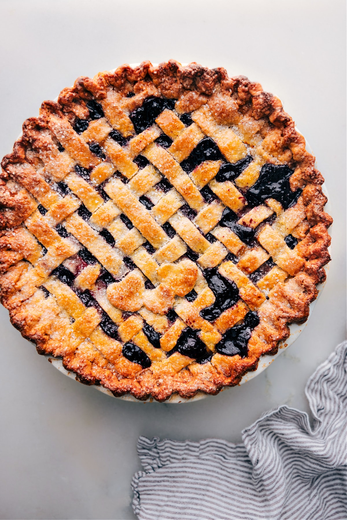 Delicious baked Berry Pie ready to be sliced and enjoyed.